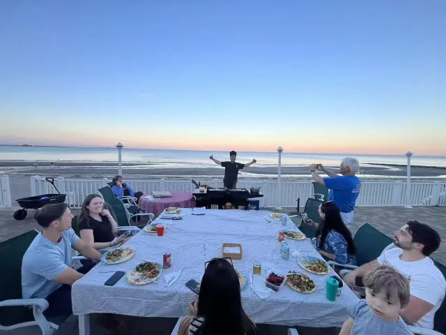 Waterfront hibachi dinner with the chef cooking at sunset